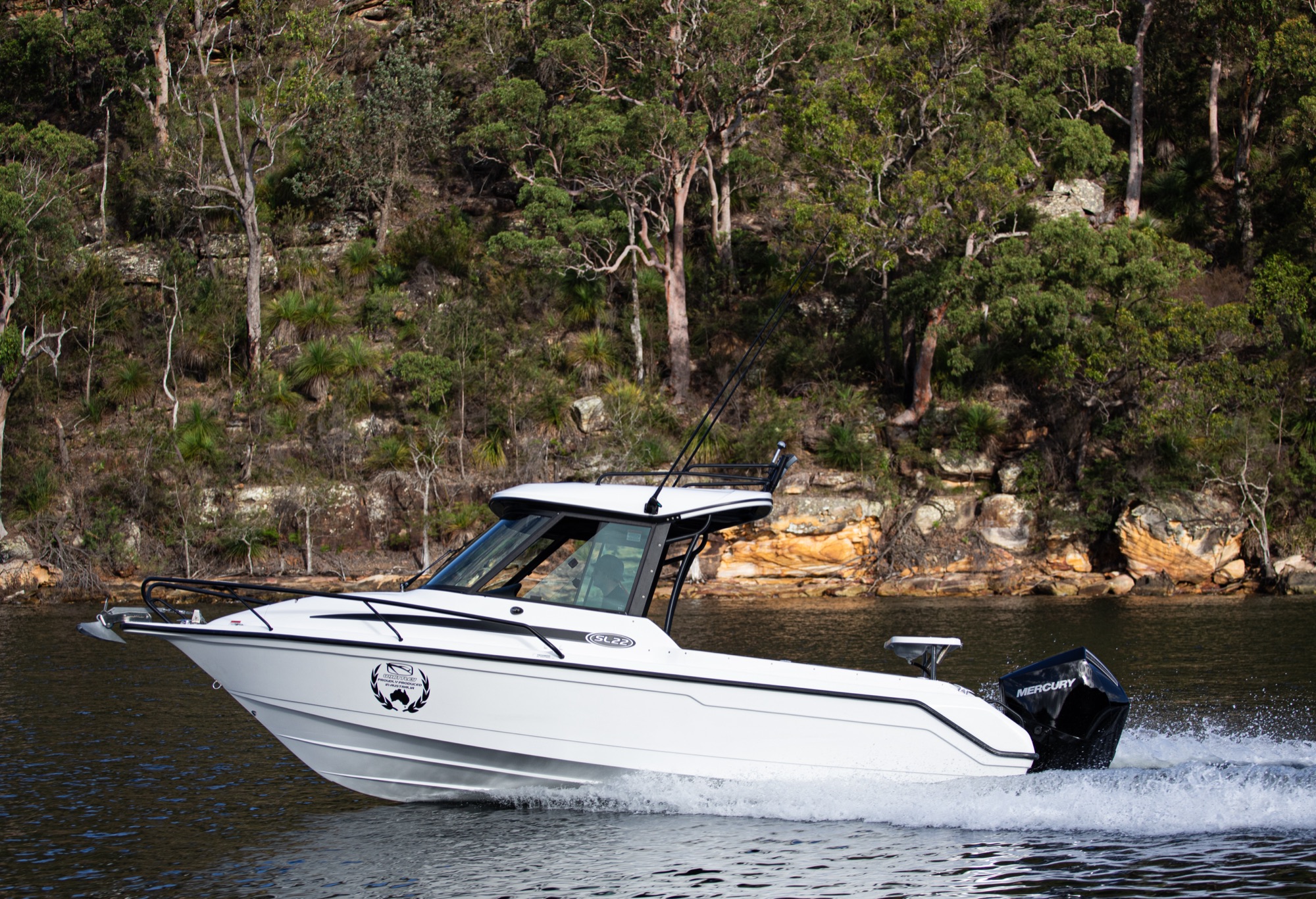 Boat underway with Mercury outboard
